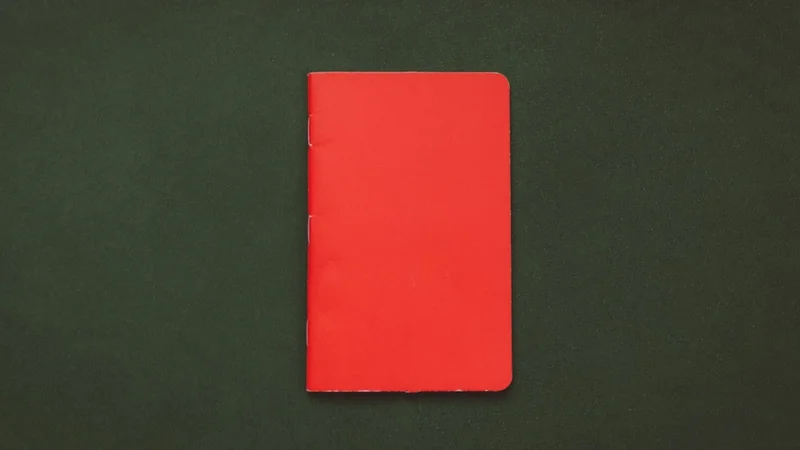 Leuchtturm1917 A5 Dotted Hardcover notebook open to a dotted grid page, showing numbered pages and the iconic back pocket — premium blank journal for personal growth writing