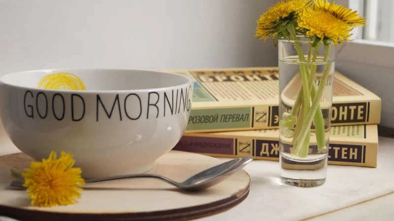 Removing one invisible drain can do more for your momentum than any new system you add | person starting fresh morning coffee desk notebook open first page natural light